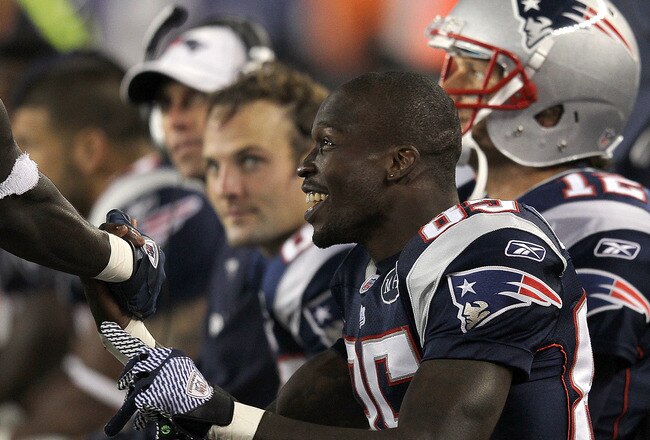 FOXBORO, MA - SEPTEMBER 18:  Chad Ochocinco  #85 of the New England Patriots reacts on the bench after a touchdown against the San Diego Chargers in the second half at Gillette Stadium on September 18, 2011 in Foxboro, Massachusetts. (Photo by Jim Rogash/Getty Images)
