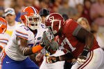 TUSCALOOSA, AL - OCTOBER 02:  Marcell Dareus #57 of the Alabama Crimson Tide against Xavier Nixon #73 of the Florida Gators at Bryant-Denny Stadium on October 2, 2010 in Tuscaloosa, Alabama.  (Photo by Kevin C. Cox/Getty Images)