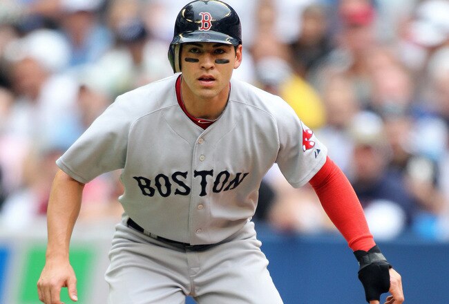 TORONTO, CANADA - JUNE 11:  Jacoby Elisbury #2 of the Boston Red Sox gets set to try and steal a base against the Toronto Blue Jays in a MLB game on June 11, 2011 at the Rogers Centre in Toronto, Ontario, Canada.  (Photo by Claus Andersen/Getty Images)