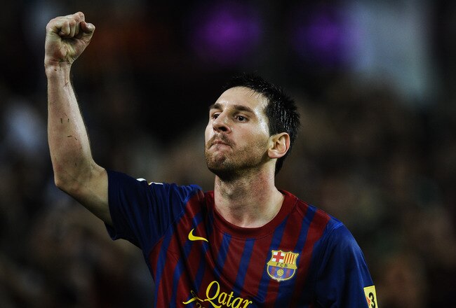 BARCELONA, SPAIN - SEPTEMBER 24:  Lionel Messi of FC Barcelona celebrates after scoring his fourth team's goal during the La Liga match between FC Barcelona and Club Atletico de Madrid at Camp Nou on September 24, 2011 in Barcelona, Spain.  (Photo by David Ramos/Getty Images)