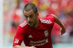 KUALA LUMPUR, MALAYSIA - JULY 16: Joe Cole of Liverpool in action during the pre-season friendly match between Malaysia and Liverpool at the Bukit Jalil National Stadium on July 16, 2011 in Kuala Lumpur, Malaysia. (Photo by Stanley Chou/Getty Images)