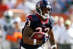 MIAMI GARDENS, FL - SEPTEMBER 18:  Running back Arian Foster #23 of the Houston Texans runs against the Miami Dolphins at Sun Life Stadium on September 18, 2011 in Miami Gardens, Florida.  (Photo by Marc Serota/Getty Images)