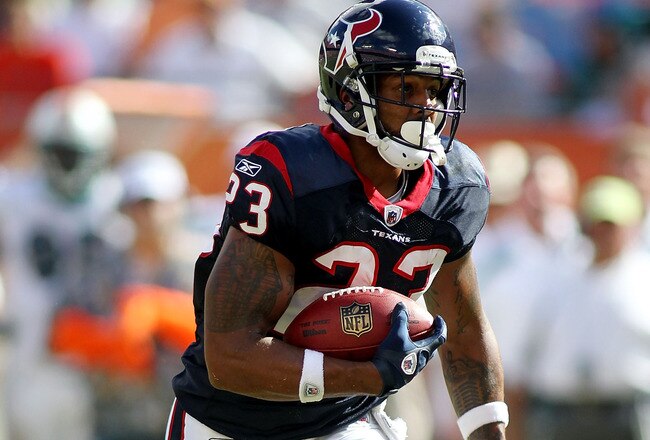 MIAMI GARDENS, FL - SEPTEMBER 18:  Running back Arian Foster #23 of the Houston Texans runs against the Miami Dolphins at Sun Life Stadium on September 18, 2011 in Miami Gardens, Florida.  (Photo by Marc Serota/Getty Images)