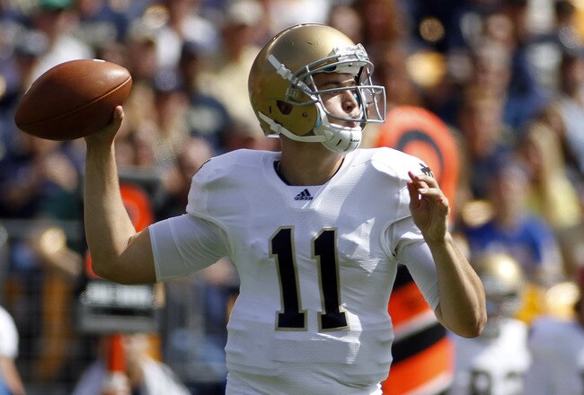 PITTSBURGH, PA - SEPTEMBER 24:  Tommy Rees #11 of the Notre Dame Fighting Irish drops back to pass against the Pittsburgh Panthers during the game on September 24, 2011 at Heinz Field in Pittsburgh, Pennsylvania.  (Photo by Justin K. Aller/Getty Images)