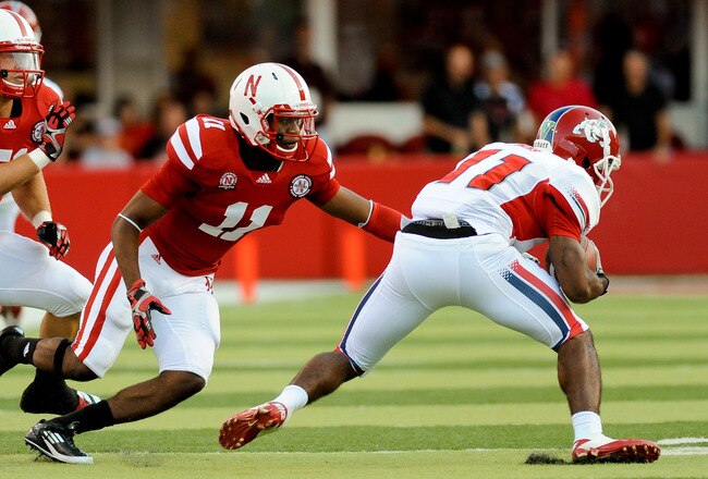 LINCOLN, NE - SEPTEMBER 10: Andrew Green #11 of the Nebraska Cornhuskers and teammate Will Compton #51 chase down Rashad Evans #11 of the Fresno State Bulldogs during their game at Memorial Stadium September 10, 2011 in Lincoln, Nebraska. Nebraska won 42-29.(Photo by Eric Francis/Getty Images)
