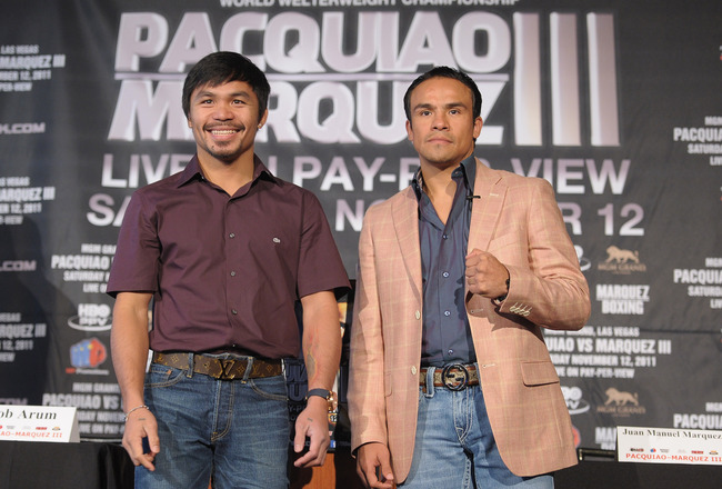 NEW YORK, NY - SEPTEMBER 06:  Professional Boxers Manny Pacquiao (L) and Juan Manuel Marquez attend the press conference for their World Welterweight Championship Fight at The Lighthouse at Chelsea Piers on September 6, 2011 in New York City.  (Photo by Michael Loccisano/Getty Images)