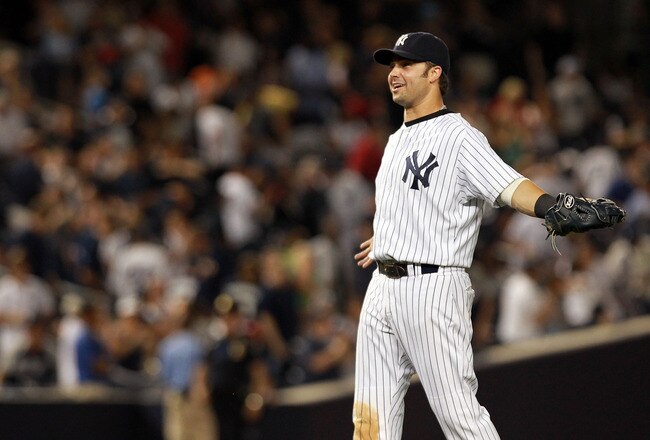 NEW YORK, NY - SEPTEMBER 24:  Nick Swisher #33 of the New York Yankees celebrates the win against the Boston Red Sox on September 24, 2011 at Yankee Stadium in the Bronx borough of New York City.  (Photo by Nick Laham/Getty Images)