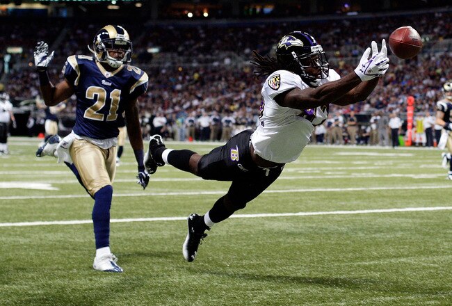 ST LOUIS, MO - SEPTEMBER 25:  Receiver Torrey Smith #82 of the Baltimore Ravens dives for a pass in the end zone as Justin King #21 of the St. Louis Rams defends during the 1st quarter of the game on September 25, 2011 at the Edward Jones Dome in St Louis, Missouri.  (Photo by Jamie Squire/Getty Images)