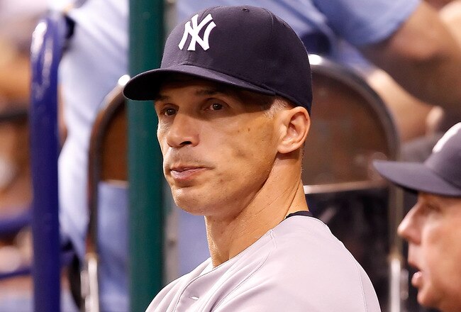 ST. PETERSBURG, FL - SEPTEMBER 27:  Manager Joe Girardi #28 of the New York Yankees directs his team against the Tampa Bay Rays during the game at Tropicana Field on September 27, 2011 in St. Petersburg, Florida.  (Photo by J. Meric/Getty Images)