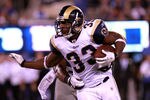 EAST RUTHERFORD, NJ - SEPTEMBER 19:  Cadillac Williams #33 of the St. Louis Rams runs the ball against the New York Giants at MetLife Stadium on September 19, 2011 in East Rutherford, New Jersey.  (Photo by Nick Laham/Getty Images)