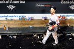 BALTIMORE, MD - SEPTEMBER 28:  Marco Scutaro #10 of the Boston Red Sox walks in the dugout after a 4-3 loss against the Baltimore Orioles at Oriole Park at Camden Yards on September 28, 2011 in Baltimore, Maryland.  (Photo by Greg Fiume/Getty Images)