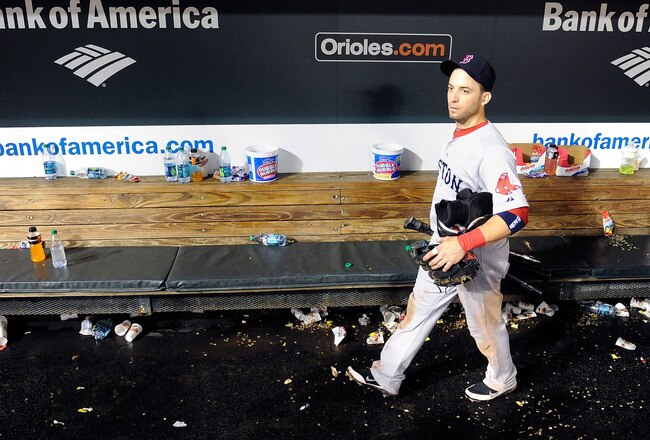 BALTIMORE, MD - SEPTEMBER 28:  Marco Scutaro #10 of the Boston Red Sox walks in the dugout after a 4-3 loss against the Baltimore Orioles at Oriole Park at Camden Yards on September 28, 2011 in Baltimore, Maryland.  (Photo by Greg Fiume/Getty Images)