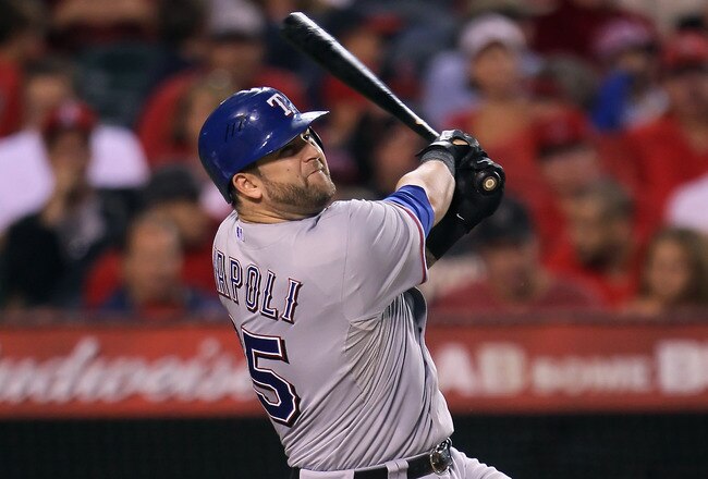 ANAHEIM, CA - SEPTEMBER 28:  Mike Napoli #25 of the Texas Rangers bats against the Los Angeles Angels of Anaheim at Angel Stadium of Anaheim on September 28, 2011 in Anaheim, California.  (Photo by Jeff Gross/Getty Images)