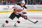 UNIONDALE, NY - SEPTEMBER 24: Zach Parise #9 of the New Jersey Devils skates during the second period of a preseason game against the New York Islanders at Nassau Coliseum on September 24, 2011 in Uniondale, New York. (Photo by Christopher Pasatieri/Getty Images for New York Islanders)