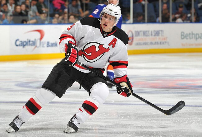 UNIONDALE, NY - SEPTEMBER 24: Zach Parise #9 of the New Jersey Devils skates during the second period of a preseason game against the New York Islanders at Nassau Coliseum on September 24, 2011 in Uniondale, New York. (Photo by Christopher Pasatieri/Getty Images for New York Islanders)
