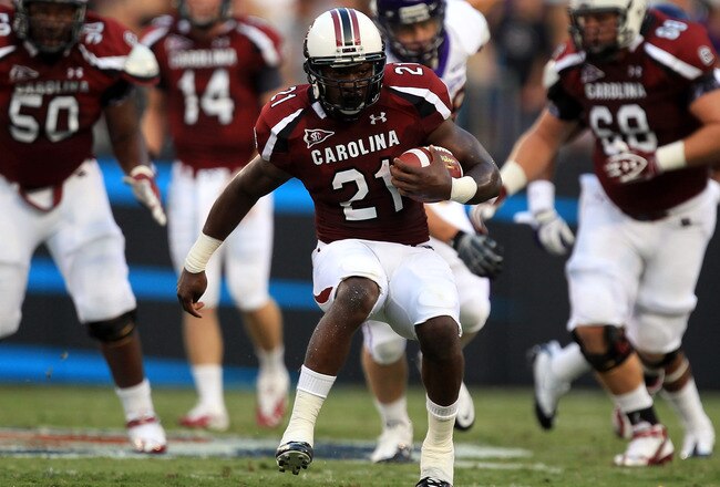 CHARLOTTE, NC - SEPTEMBER 03:  Marcus Lattimore #21 of the South Carolina Gamecocks during their game against the East Carolina Pirates at Bank of America Stadium on September 3, 2011 in Charlotte, North Carolina.  (Photo by Streeter Lecka/Getty Images)