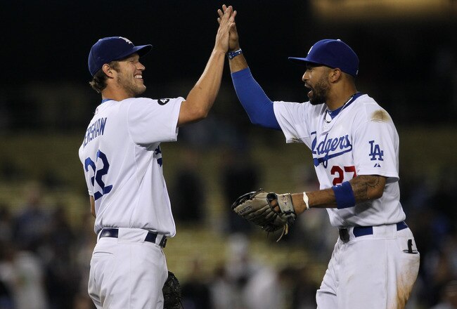 LOS ANGELES, CA - JUNE 20:  Starting pitcher Clayton Kershaw #22 and center fielder Matt Kemp #27 of the Los Angeles Dodgers celebrate after Kershaw's complete game shoutout against the Detroit Tigers on June 20, 2011 at Dodger Stadium in Los Angeles, California.  The Dodgers won 4-0.  (Photo by Stephen Dunn/Getty Images)