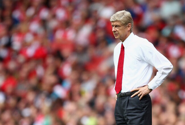 LONDON, ENGLAND - SEPTEMBER 10:  Arsene Wenger manager of Arsenal looks thoughtful during the Barclays Premier League match between Arsenal and Swansea City at Emirates Stadium on September 10, 2011 in London, England.  (Photo by Clive Mason/Getty Images)