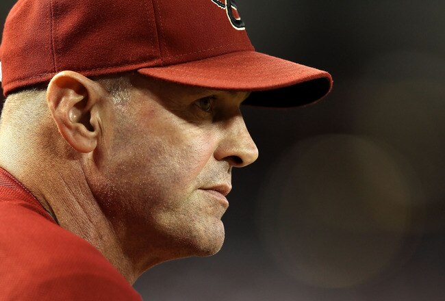 PHOENIX, AZ - SEPTEMBER 28:  Manager Kirk Gibson of the Arizona Diamondbacks watches from the dugout during the Major League Baseball game against the Los Angeles Dodgers at Chase Field on September 28, 2011 in Phoenix, Arizona.  The Dodgers defeated the Diamondbacks 7-5. (Photo by Christian Petersen/Getty Images)