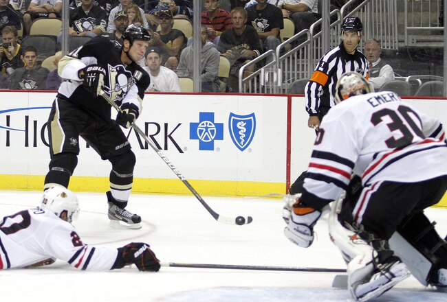 PITTSBURGH, PA - SEPTEMBER 22:  Jordan Staal #11 of the Pittsburgh Penguins takes a shot on goal against the Chicago Blackhawks during a preseason game at Consol Energy Center on September 22, 2011 in Pittsburgh, Pennsylvania.  The Penguins defeated the Blackhawks 4-1.  (Photo by Justin K. Aller/Getty Images)