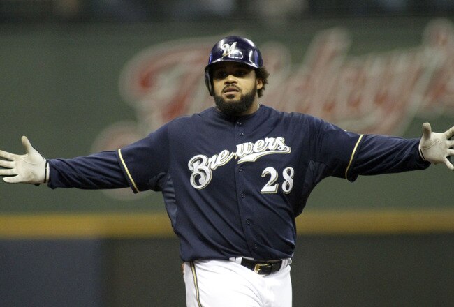 MILWAUKEE, WI - SEPTEMBER 28: Prince Fielder #28 of the Milwaukee Brewers reacts after hitting a double against the Pittsburgh Pirates in the fourth inning at a Major League Baseball game at Miller Park Stadium on September 28, 2011 in Milwaukee, Wisconsin.  (Photo by Darren Hauck/Getty Images)