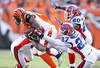 CINCINNATI - NOVEMBER 21:  Cedric Benson #32 of the Cincinnati Bengals is tackled by Jarius Byrd #31, Reggie Corner #27  and Donte Whitner #20 of the Buffalo Bills during the NFL game at Paul Brown Stadium on November 21, 2010 in Cincinnati, Ohio.  (Photo by Andy Lyons/Getty Images)