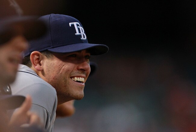 ARLINGTON, TX - SEPTEMBER 30:  Matt Moore #55 of the Tampa Bay Rays smiles in the dugout in the 9th inning against the Texas Rangers during Game One of the American League Division Series at Rangers Ballpark in Arlington on September 30, 2011 in Arlington, Texas.  (Photo by Ronald Martinez/Getty Images)
