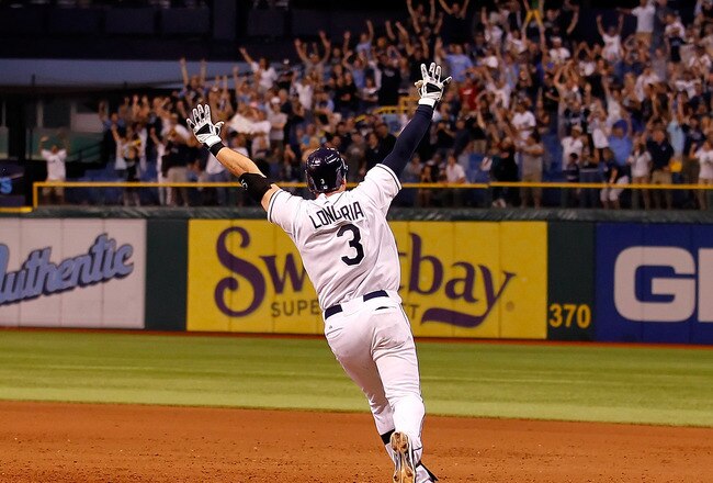 ST. PETERSBURG, FL - SEPTEMBER 28:  Evan Longoria #3 of the Tampa Bay Rays rounds the bases after his game-winning walk off home run in the twelfth inning against the New York Yankees during the game at Tropicana Field on September 28, 2011 in St. Petersburg, Florida.  (Photo by J. Meric/Getty Images)