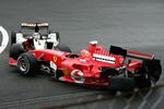 SPA FRANCORCHAMPS, BELGIUM - SEPTEMBER 11:  Michael Schumacher of Germany and Ferrari is involved in a collision with Takuma Sato of Japan and B.A.R during the Belgium F1 Grand Prix at the Circuit of Spa Francorchamps on September 11, 2005, in Spa Francorchamps, Belgium.  (Photo by Mark Thompson/Getty Images)