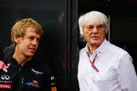MONZA, ITALY - SEPTEMBER 11:  F1 supremo Bernie Ecclestone (R) talks with Red Bull Racing driver Sebastian Vettel (L) before the Italian Formula One Grand Prix at the Autodromo Nazionale di Monza on September 11, 2011 in Monza, Italy.  (Photo by Paul Gilham/Getty Images)