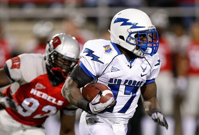 LAS VEGAS - NOVEMBER 18:  Asher Clark #17 of the Air Force Falcons runs for yardage against the UNLV Rebels during their game at Sam Boyd Stadium November 18, 2010 in Las Vegas, Nevada. Air Force won 35-20.  (Photo by Ethan Miller/Getty Images)