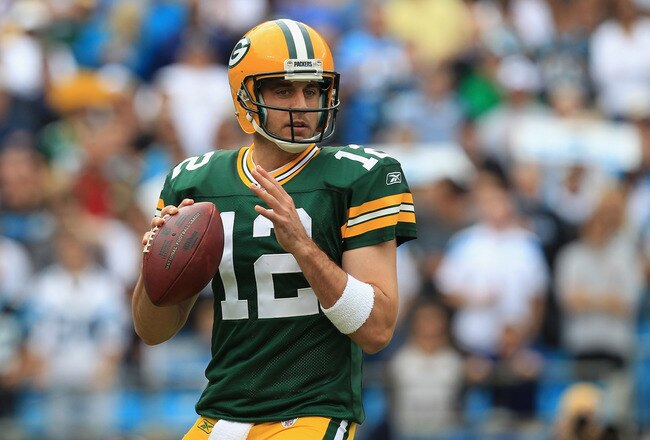CHARLOTTE, NC - SEPTEMBER 18:  Aaron Rodgers #12 of the Green Bay Packers against the Carolina Panthers during their game at Bank of America Stadium on September 18, 2011 in Charlotte, North Carolina.  (Photo by Streeter Lecka/Getty Images)