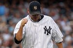 NEW YORK, NY - SEPTEMBER 24:  Freddy Garcia #36 of the New York Yankees celebrates an inning ending out against the Boston Red Sox on September 24, 2011 at Yankee Stadium in the Bronx borough of New York City.  (Photo by Nick Laham/Getty Images)