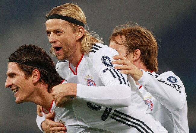 ROME - NOVEMBER 23:  Mario Gomez (L) with his teammate Anatoliy Tymoshchuk #44 and Andreas Ottl (R) of FC Bayern Muenchen celebrates after scoring the second goal during the UEFA Champions League Group E match between AS Roma and FC Bayern Muenchen at Stadio Olimpico on November 23, 2010 in Rome, Italy.  (Photo by Paolo Bruno/Getty Images)