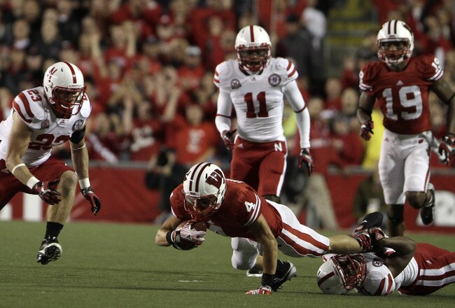 MADISON, WI - OCTOBER 1: Ciante Evans #17 of the Nebraska Cornhuskers tackles Jared Abbrederis #4 of the Wisconsin Badgers October 1, 2011 at Camp Randall Stadium in Madison, Wisconsin.  (Photo by John Gress/Getty Images)