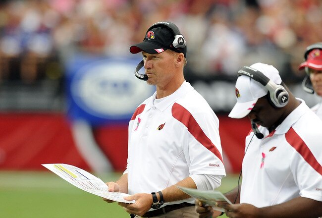 GLENDALE, AZ - OCTOBER 02:  Arizona Cardinals Head Coach Ken Whisenhunt sends in a play against the New York Giants at University of Phoenix Stadium on October 2, 2011 in Glendale, Arizona.  (Photo by Norm Hall/Getty Images)