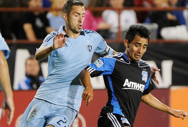 SANTA CLARA, CA - OCTOBER 01: Rafael Baca #30 of the San Jose Earthquakes dribbles the ball away from Davy Arnaud #22 of the Sporting Kansas City during an MLS soccoer game at Buck Shaw Stadium on October 1, 2011 in Santa Clara, California. The game ended in a 1 to 1 tie. (Photo by Thearon W. Henderson/Getty Images)