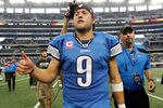 ARLINGTON, TX - OCTOBER 02:   Matthew Stafford #9 of the Detroit Lions gives a thumbs-up as he walks off the field after the Lions beat the Dallas Cowboys 34-30 at Cowboys Stadium on October 2, 2011 in Arlington, Texas.  (Photo by Tom Pennington/Getty Images)