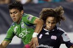FOXBORO, MA - OCTOBER 01:  Kevin Alston #30 of the New England Revolution and Fredy Montero #17 of the Seattle Sounders FC battle for the ball in the first half on October 1, 2011 at Gillette Stadium in Foxboro, Massachusetts.  (Photo by Elsa/Getty Images)