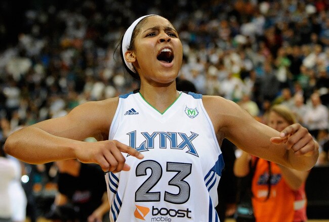 MINNEAPOLIS, MN - OCTOBER 2: Maya Moore #23 of the Minnesota Lynx celebrates a win against the Atlanta Dream after Game One of the 2011 WNBA Finals on October 2, 2011 at Target Center in Minneapolis, Minnesota. The Lynx defeated the Dream 88-74. NOTE TO USER: User expressly acknowledges and agrees that, by downloading and or using this Photograph, user is consenting to the terms and conditions of the Getty Images License Agreement. (Photo by Hannah Foslien/Getty Images)