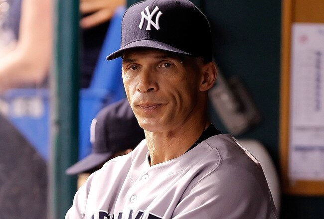 ST. PETERSBURG, FL - SEPTEMBER 26:  Manager Joe Girardi #28 of the New York Yankees directs his team against the Tampa Bay Rays during the game at Tropicana Field on September 26, 2011 in St. Petersburg, Florida.  (Photo by J. Meric/Getty Images)