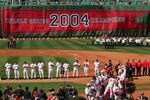 BOSTON - APRIL 11:  The Boston Red Sox celebrate their 2004 World Series Championship during a pre-game ceremony prior to the game against the New York Yankees at Fenway Park on April 11, 2005 in Boston, Massachusetts. The Red Sox won 8-1.  (Photo by Ezra Shaw /Getty Images)