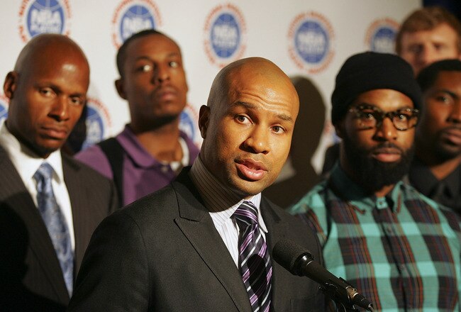 NEW YORK, NY - SEPTEMBER 30:  Derek Fisher, President of the National Basketball Players Association, with NBA players (L-R) Ray Allen, Paul Pierce and Baron Davis, speaks at a press conference after NBA labor negotiations at The Waldorf-Astoria on September 30, 2011 in New York City.  (Photo by Michael Cohen/Getty Images)