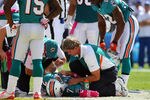 SAN DIEGO, CA - OCTOBER 2:   Quarterback Chad Henne #7 of Miami Dolphins lies on the ground with an injury against the San Diego Chargers during the first half of their NFL Game on October 2, 2011 at Qualcomm Stadium in San DIego, California. (Photo by Donald Miralle/Getty Images)