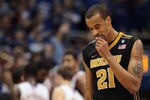 LAWRENCE, KS - FEBRUARY 07:  Laurence Bowers #21 of the Missouri Tigers reacts after a foul during the game against the Kansas Jayhawks on February 7, 2011 at Allen Fieldhouse in Lawrence, Kansas.  (Photo by Jamie Squire/Getty Images)