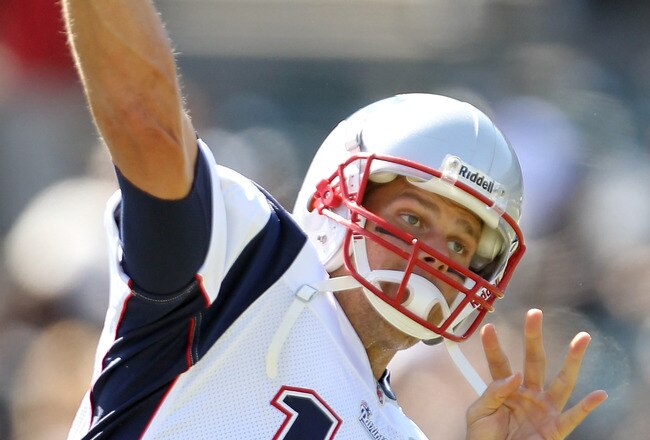 OAKLAND, CA - OCTOBER 02:  Tom Brady #12 of the New England Patriots warms up before their game against the Oakland Raiders at O.co Coliseum on October 2, 2011 in Oakland, California.  (Photo by Ezra Shaw/Getty Images)