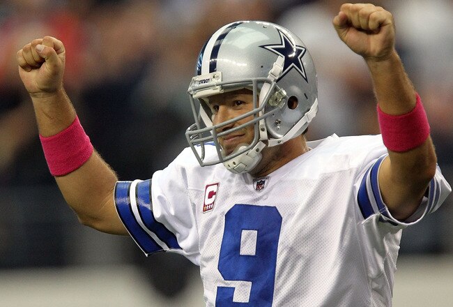 ARLINGTON, TX - OCTOBER 02:  Tony Romo #9 of the Dallas Cowboys celebrates a touchdown against the Detroit Lions at Cowboys Stadium on October 2, 2011 in Arlington, Texas.  (Photo by Ronald Martinez/Getty Images)