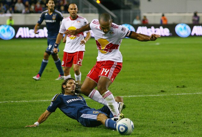 HARRISON, NJ - OCTOBER 04: Frankie Hejduk #6 of the Los Angeles Galaxy defends as Thierry Henry #14 of the New York Red Bulls plays the ball during the game at Red Bull Arena on October 4, 2011 in Harrison, New Jersey. (Photo by Andy Marlin/Getty Images)