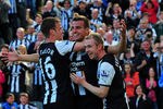 NEWCASTLE UPON TYNE, ENGLAND - MAY 22: Newcastle player Steven Taylor (c) celebrates his goal with Ryan Taylor (l) and Shane Ferguson during the Barclays Premier League game between Newcastle United and West Bromwich Albion at St James' Park on May 22, 2011 in Newcastle upon Tyne, England.  (Photo by Stu Forster/Getty Images)