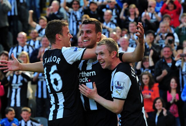 NEWCASTLE UPON TYNE, ENGLAND - MAY 22: Newcastle player Steven Taylor (c) celebrates his goal with Ryan Taylor (l) and Shane Ferguson during the Barclays Premier League game between Newcastle United and West Bromwich Albion at St James' Park on May 22, 2011 in Newcastle upon Tyne, England.  (Photo by Stu Forster/Getty Images)